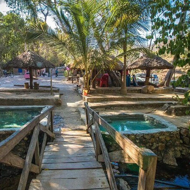 Thermal pool with palapa shade at the hot springs