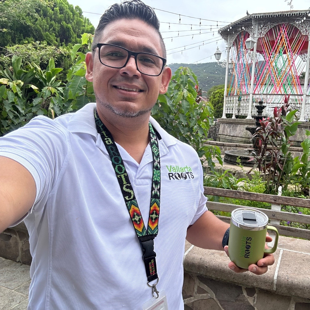 Vallarta Roots guide beside the decorated town square gazebo in San Sebastián del Oeste