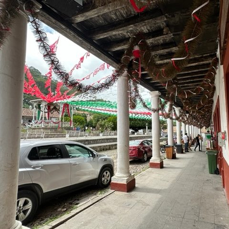 Decorated arcade on the main square of San Sebastián del Oeste